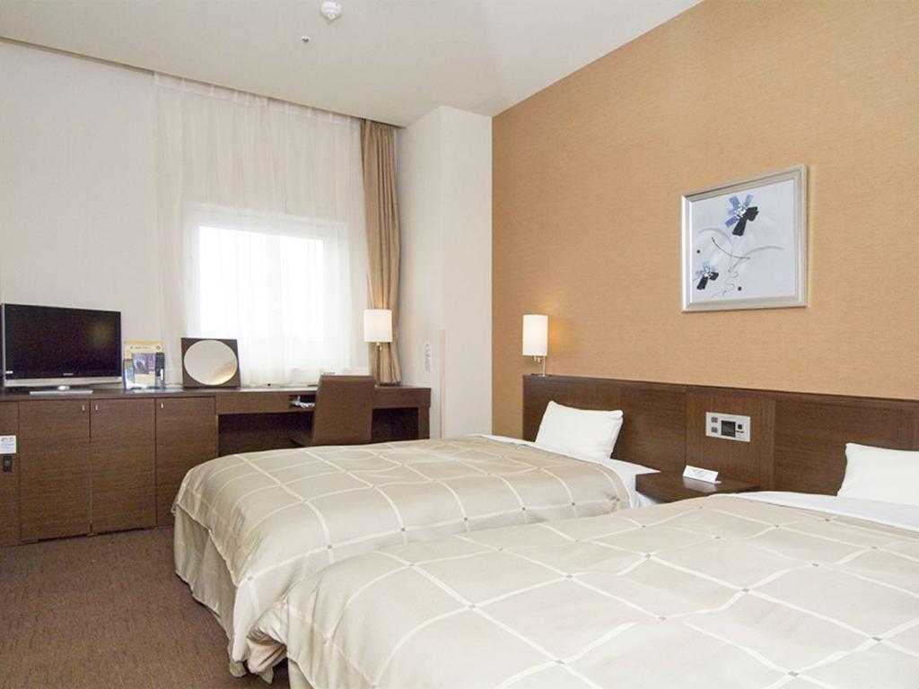 Hotel Route-Inn Higashimuroran Ekimae Екстер'єр фото